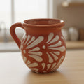 Handmade Mexican Clay Jarrito Talavera Mug with brown pottery finish, featuring traditional decorative patterns.