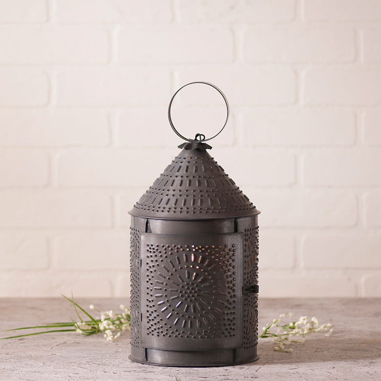 Rustic 15-inch fireside lantern in Kettle Black with candle holder, ideal for cozy home decor and outdoor lighting.