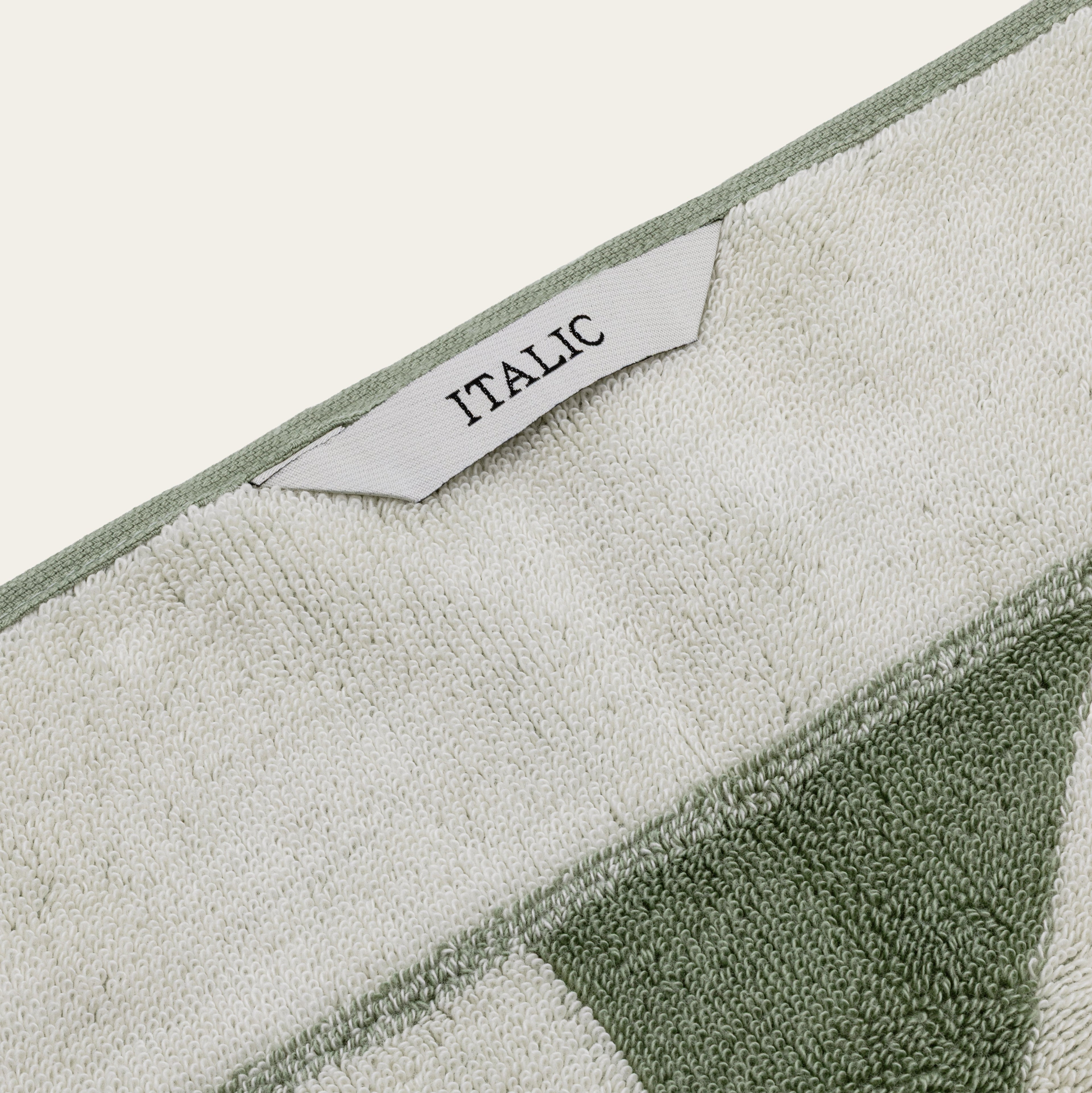 Italic Umbra Australian Cotton Bath Towels displayed on a bathroom rack, showcasing soft, plush texture and high-quality cotton fabric.