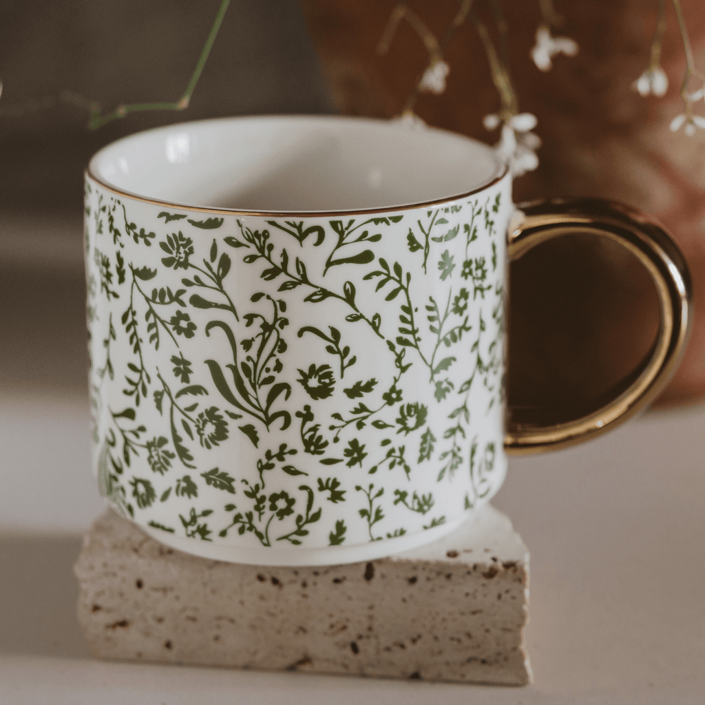Green Ditsy Floral 14 oz coffee mug by Sweet Water Decor with a spring-inspired floral design.
