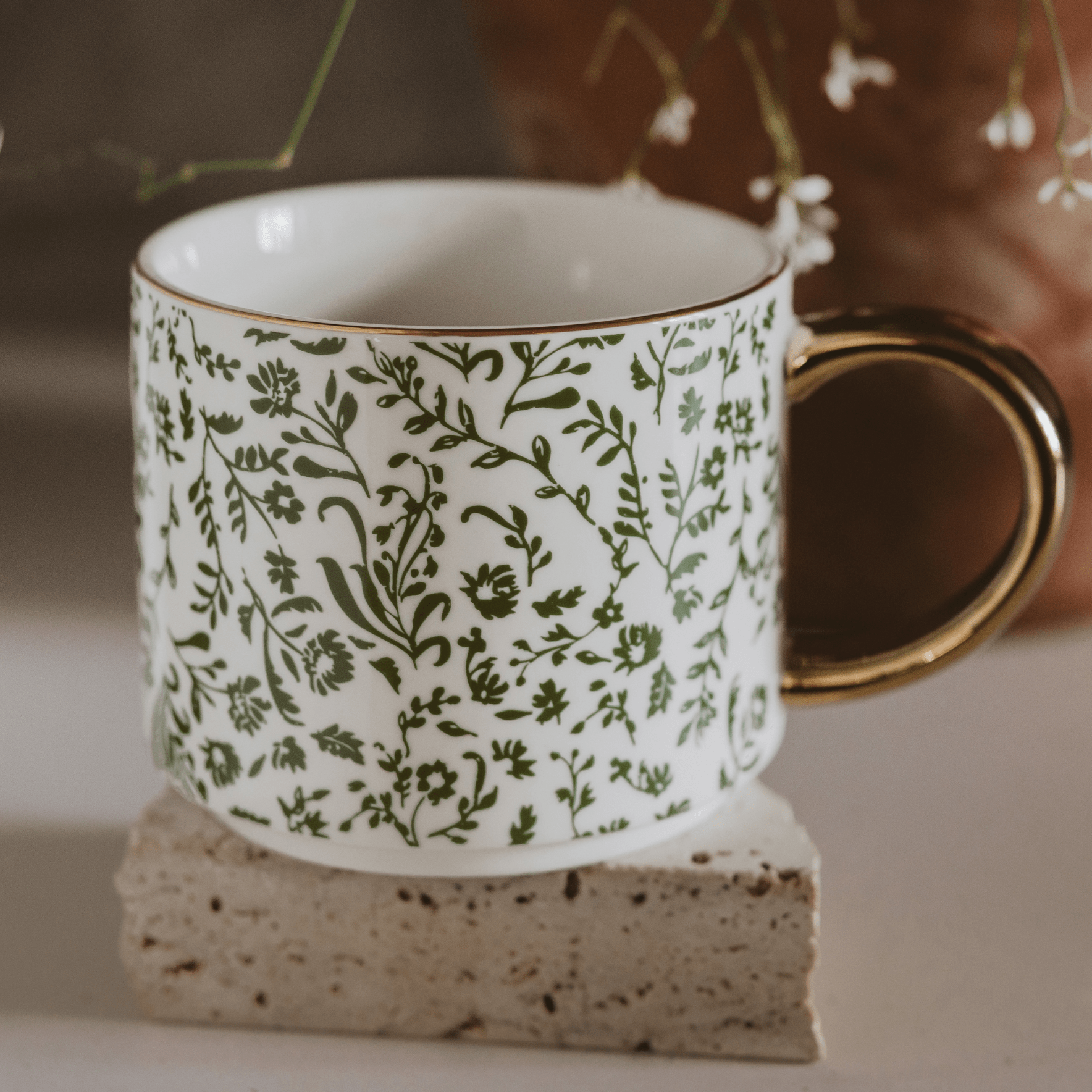Green Ditsy Floral 14 oz coffee mug by Sweet Water Decor with a spring-inspired floral design.