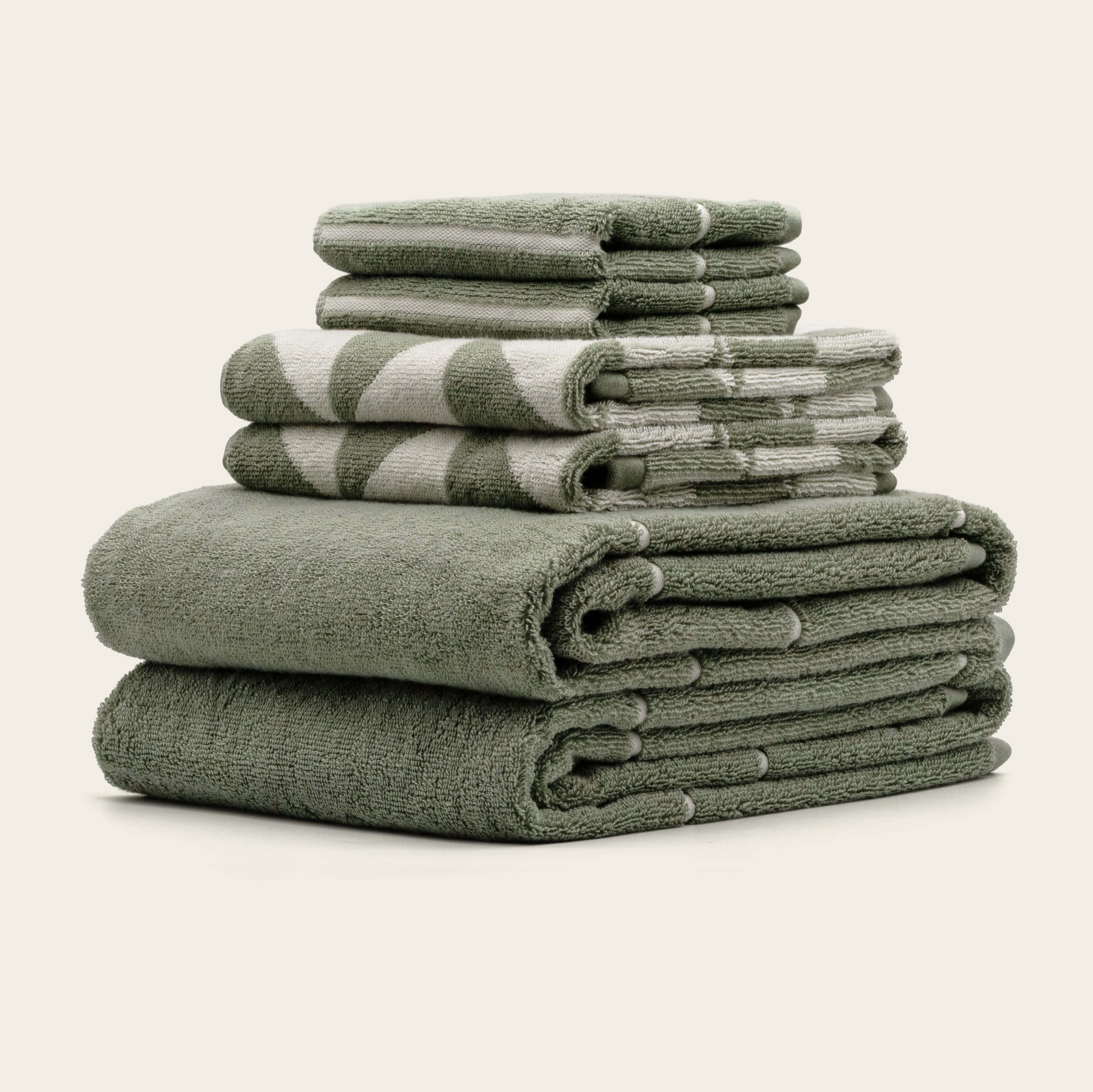 Set of Italic Umbra Australian Cotton Bath Towels, soft and plush with a clean, white design perfect for home bathroom use.