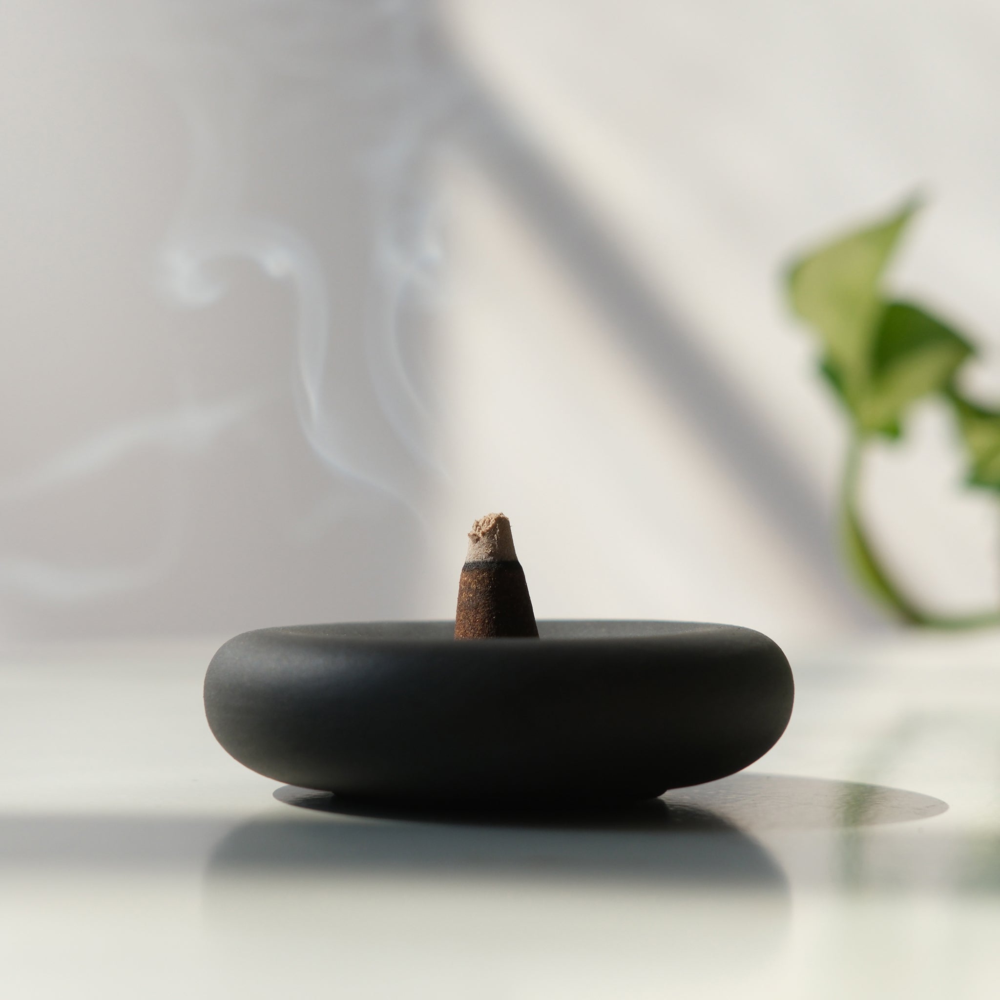 Black Eve Incense holder by Misewell, a stylish home accessory with a sleek, modern design for incense burning.