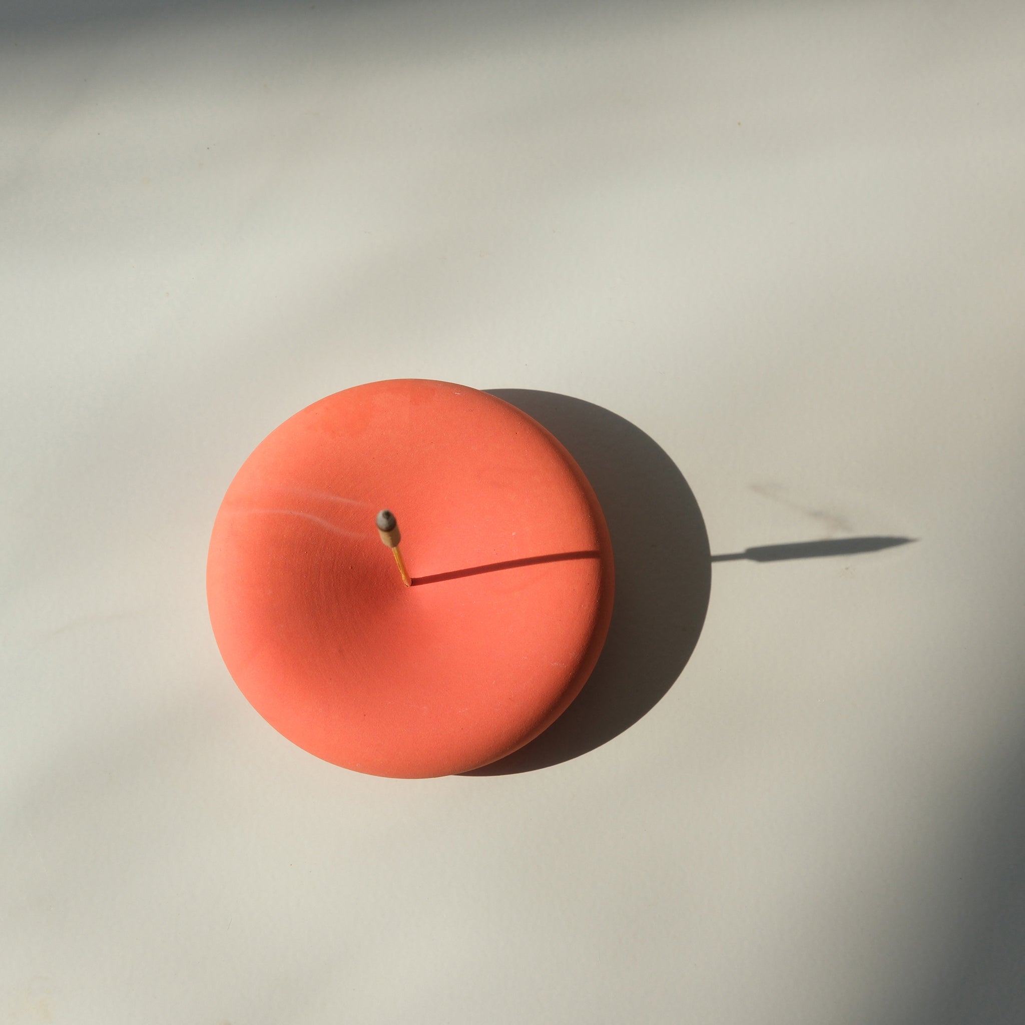 Eve Incense by Misewell, blood orange scented home accessory with a square packaging design.