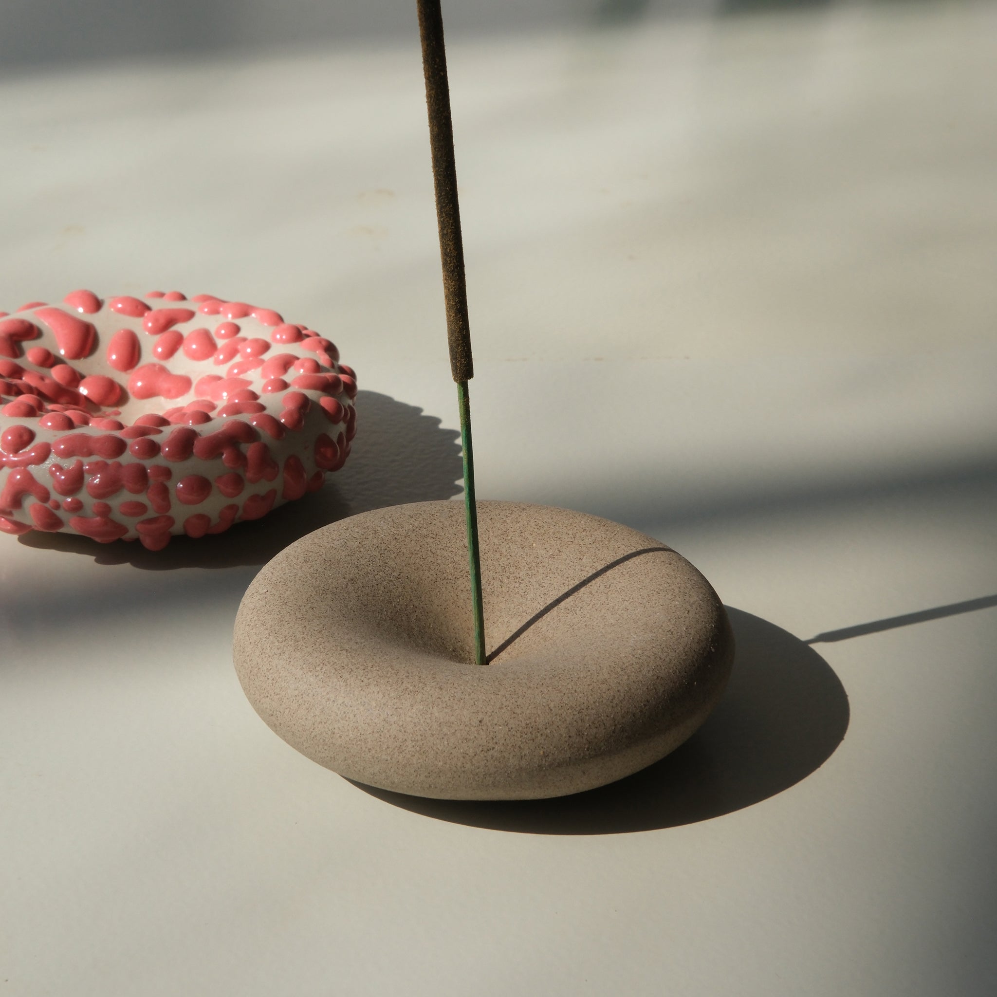 Dark sand-colored Eve Incense home accessory by Misewell, showcasing a sleek, square-shaped design for aromatic home decor.
