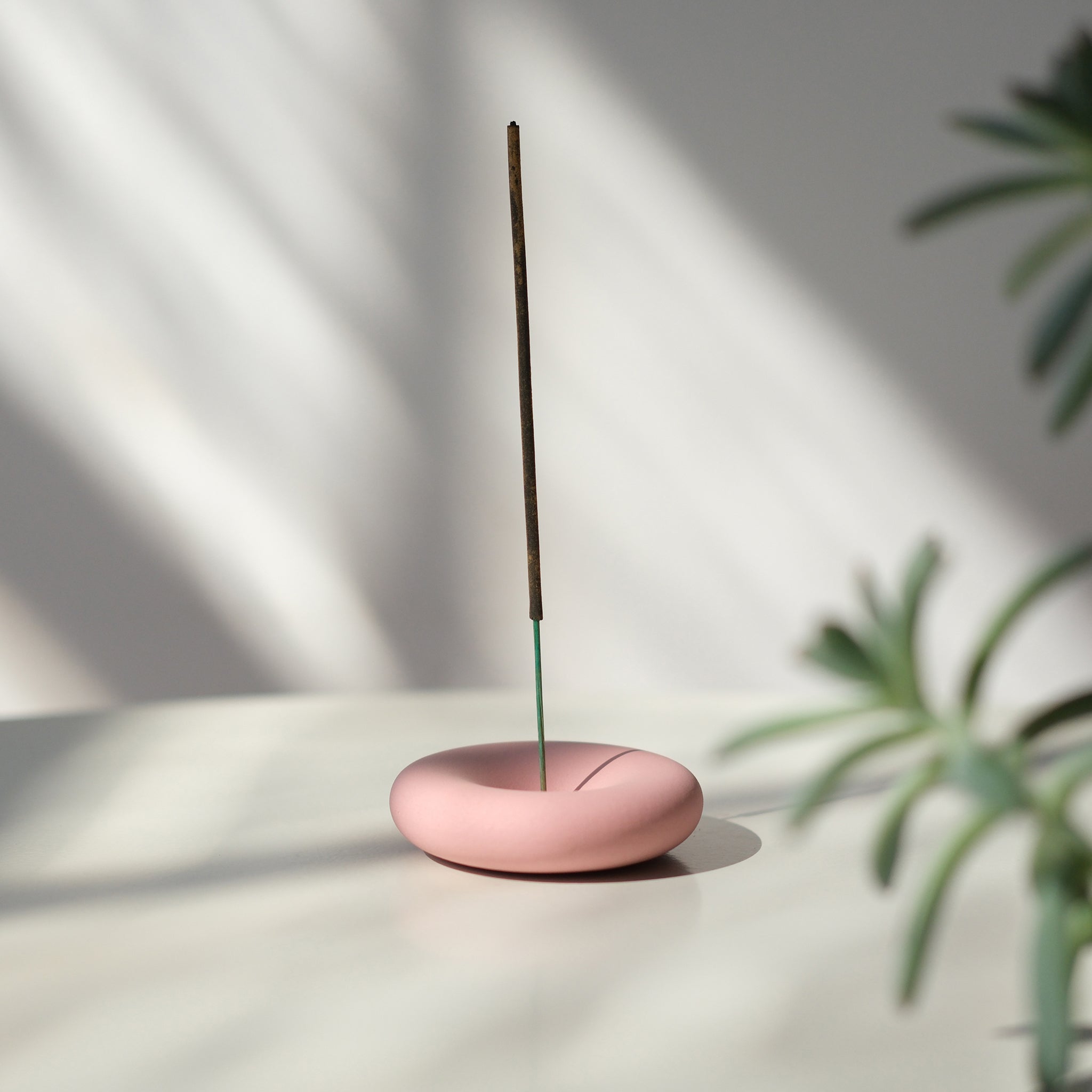 Pink Eve Incense sticks in a container, designed for home ambiance and relaxation, from the Misewell Eve Incense collection.