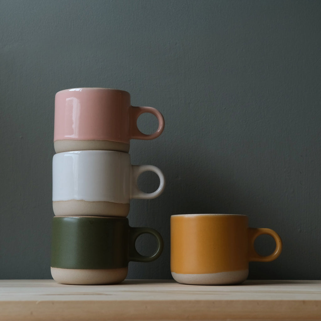 Misewell Scotty Mug tumbler with dipped handle, featuring a colorful hand-dipped design on a ceramic mug.