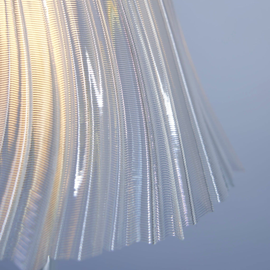 Slim tall Pleat Lamp by Wooj Design featuring a modern pleated fabric shade and sleek base, ideal for contemporary home lighting.