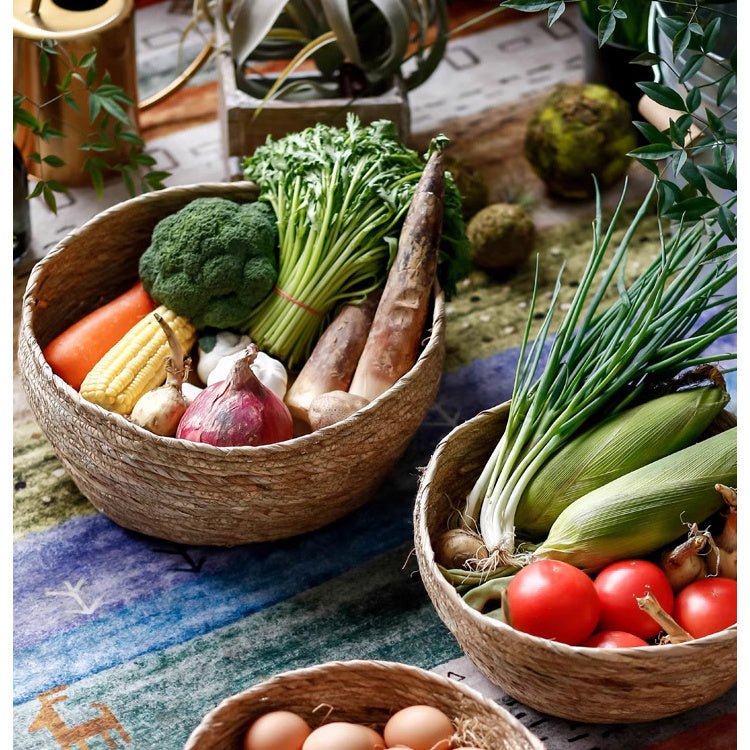 RusticReach seagrass bowl basket for storage or display, showing a woven, natural fiber basket with handles on a wooden surface.