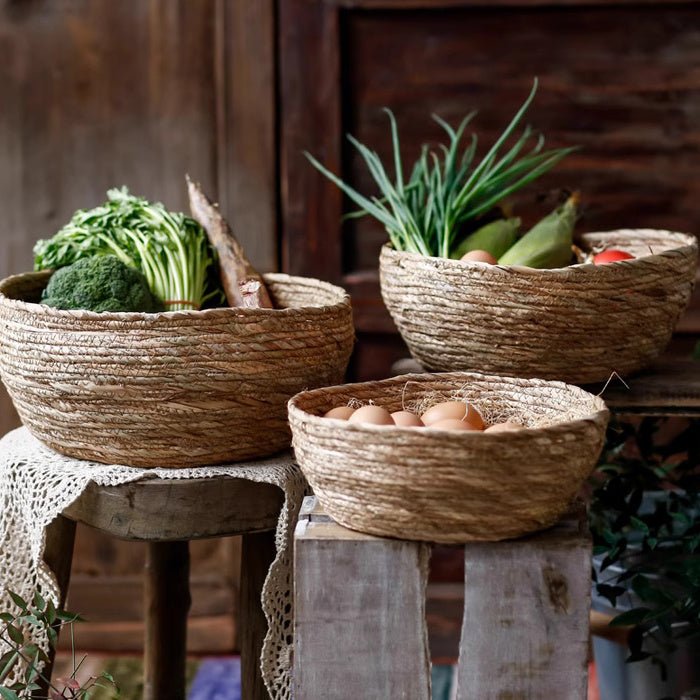 RusticReach seagrass bowl basket for storage or display, woven basket with natural seagrass texture and sturdy handles.