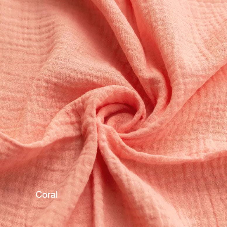 Wendy Anne Snuggle Me Infant Lounger slip cover in organic cotton double gauze, coral color, designed for cozy infant comfort.