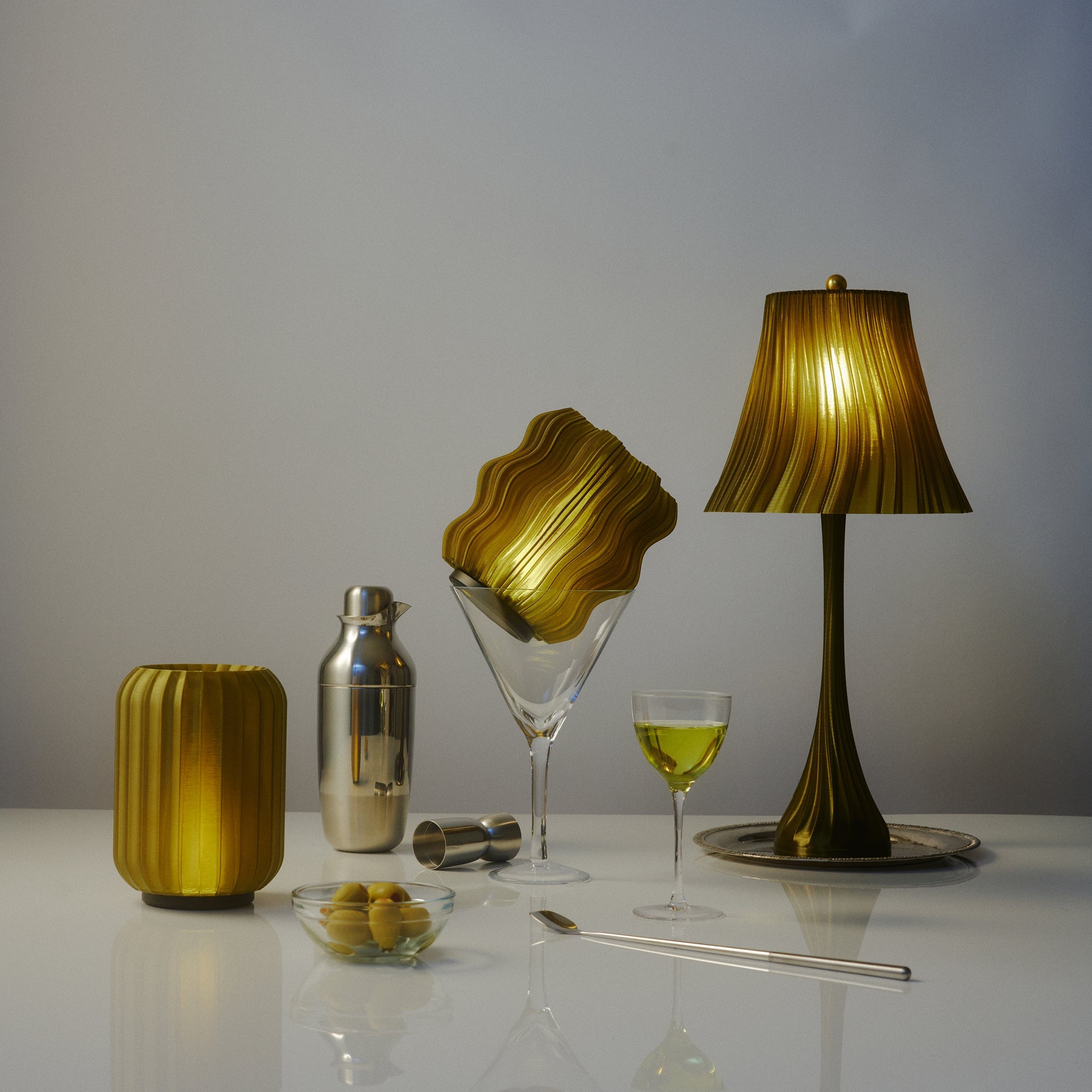 Wooj Design pleat lamp with a sleek, modern design, featuring a pleated fabric shade and warm lighting.