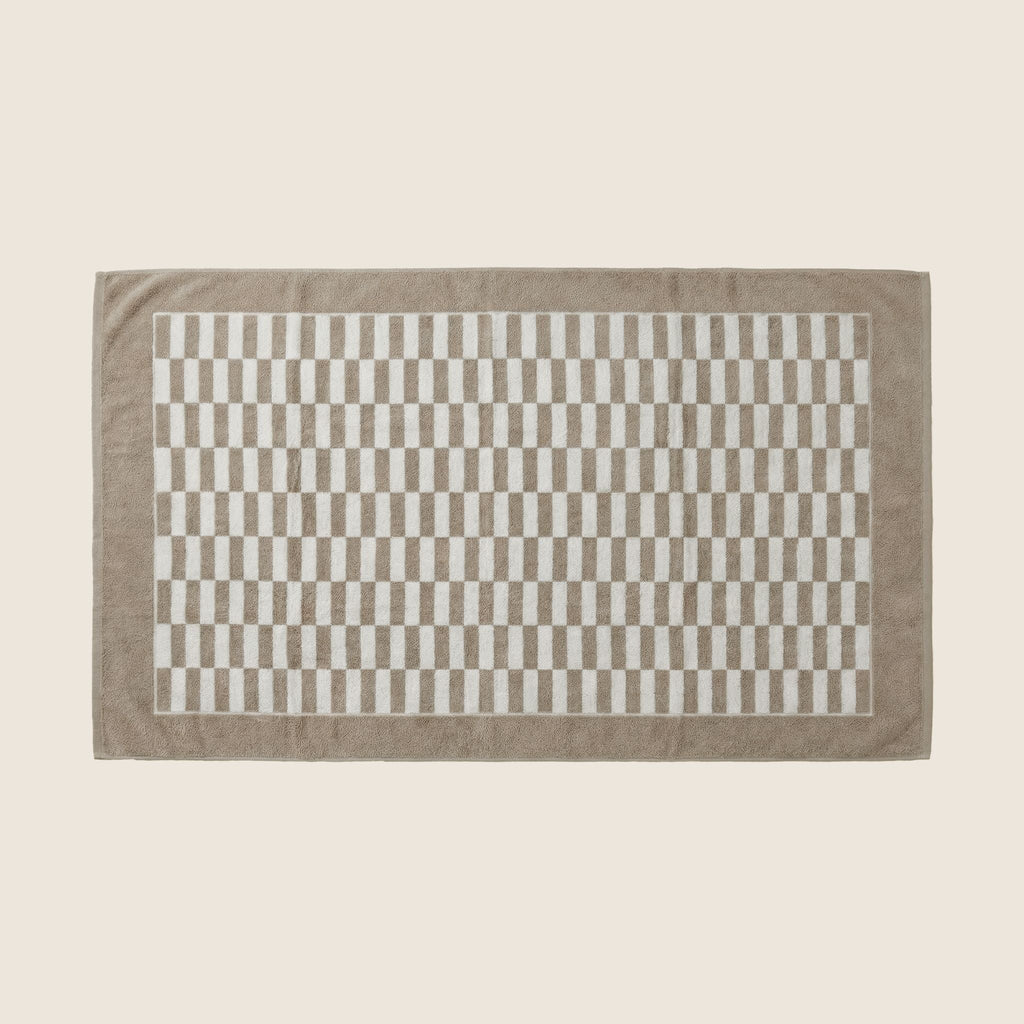 Brown Pietra Australian cotton towel by Italic, flat lay showing soft, plush texture and quality craftsmanship.