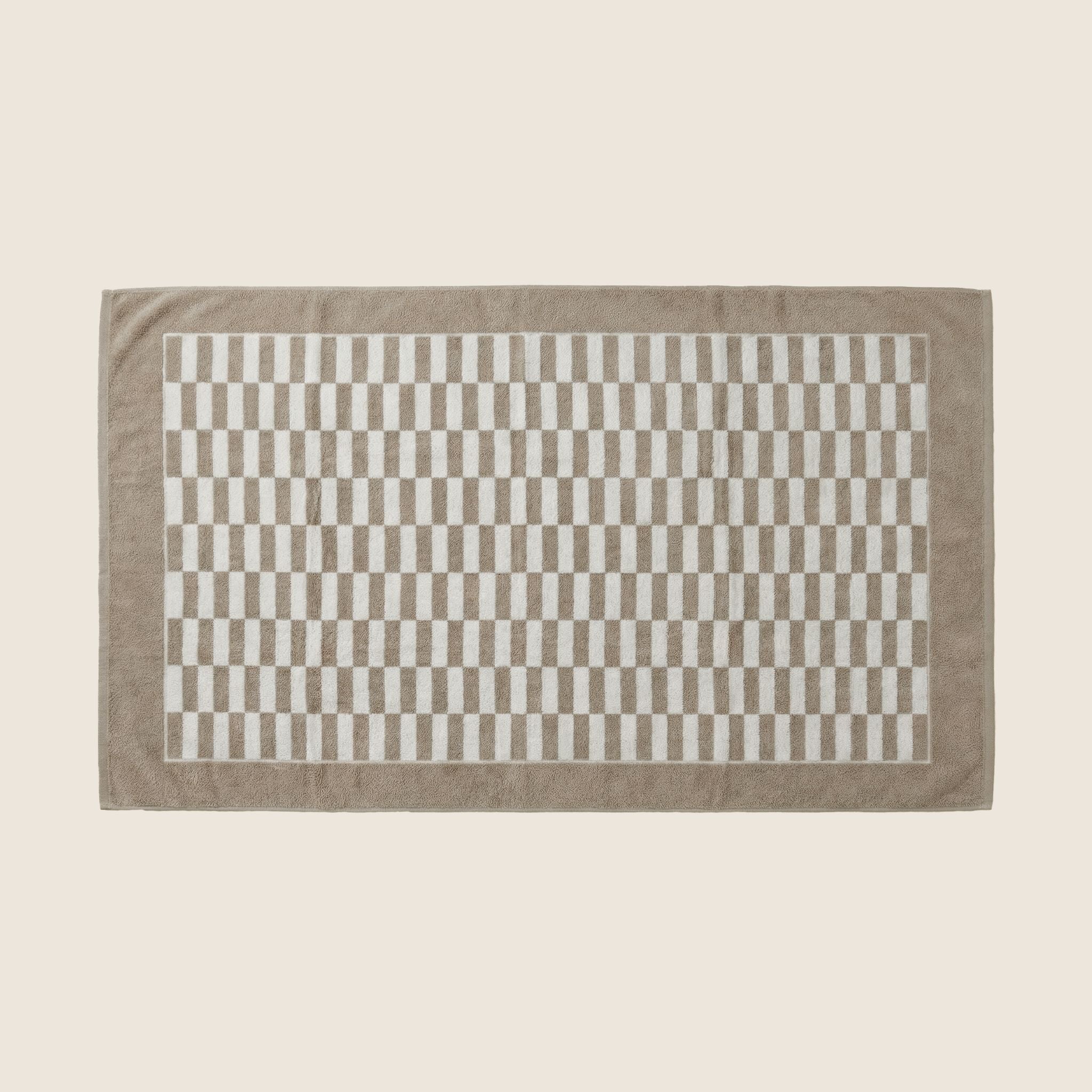 Brown Pietra Australian cotton towel by Italic, flat lay showing soft, plush texture and quality craftsmanship.