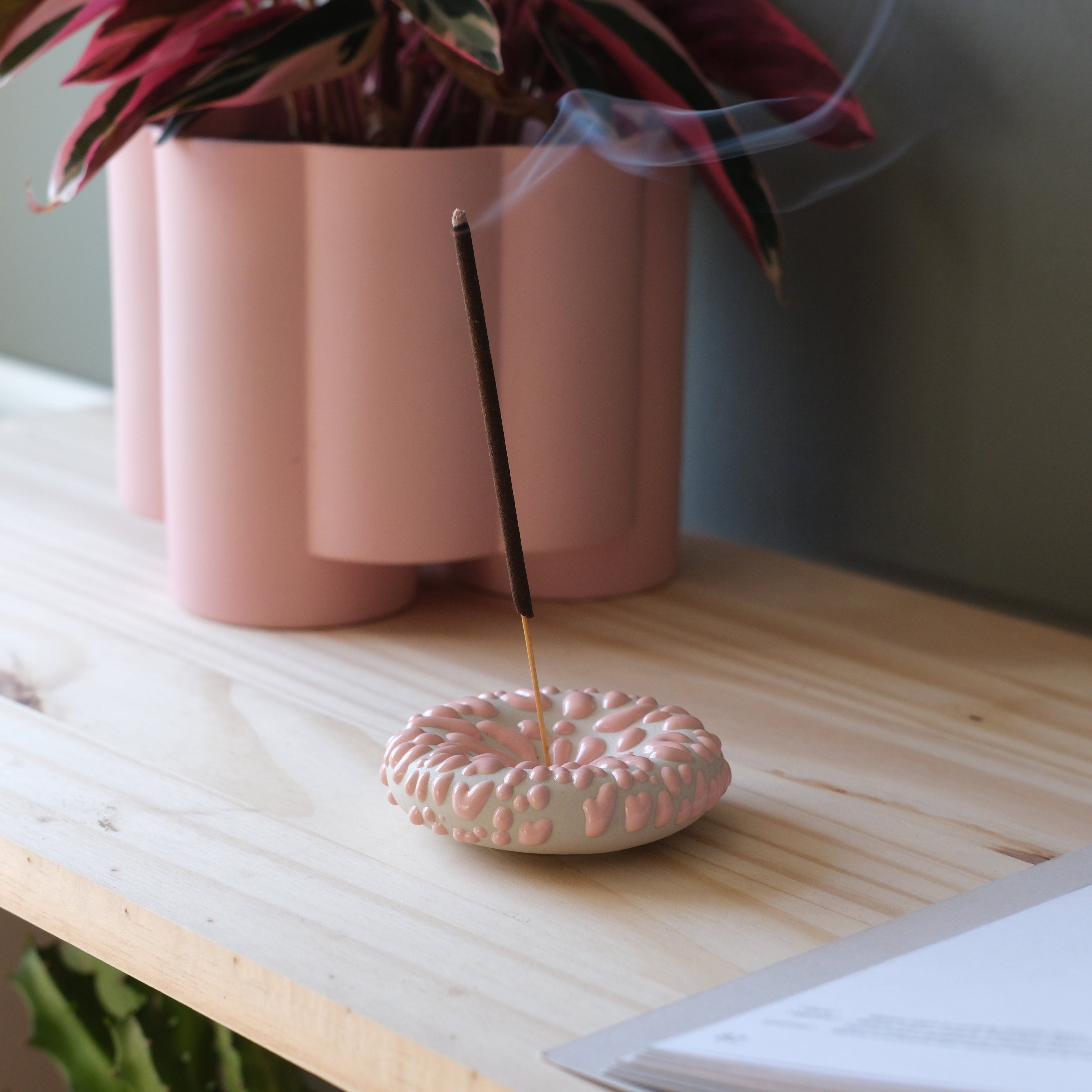 Pink Eve Incense sticks by Misewell, a home accessory with a soft pink glow, perfect for creating a calming atmosphere.