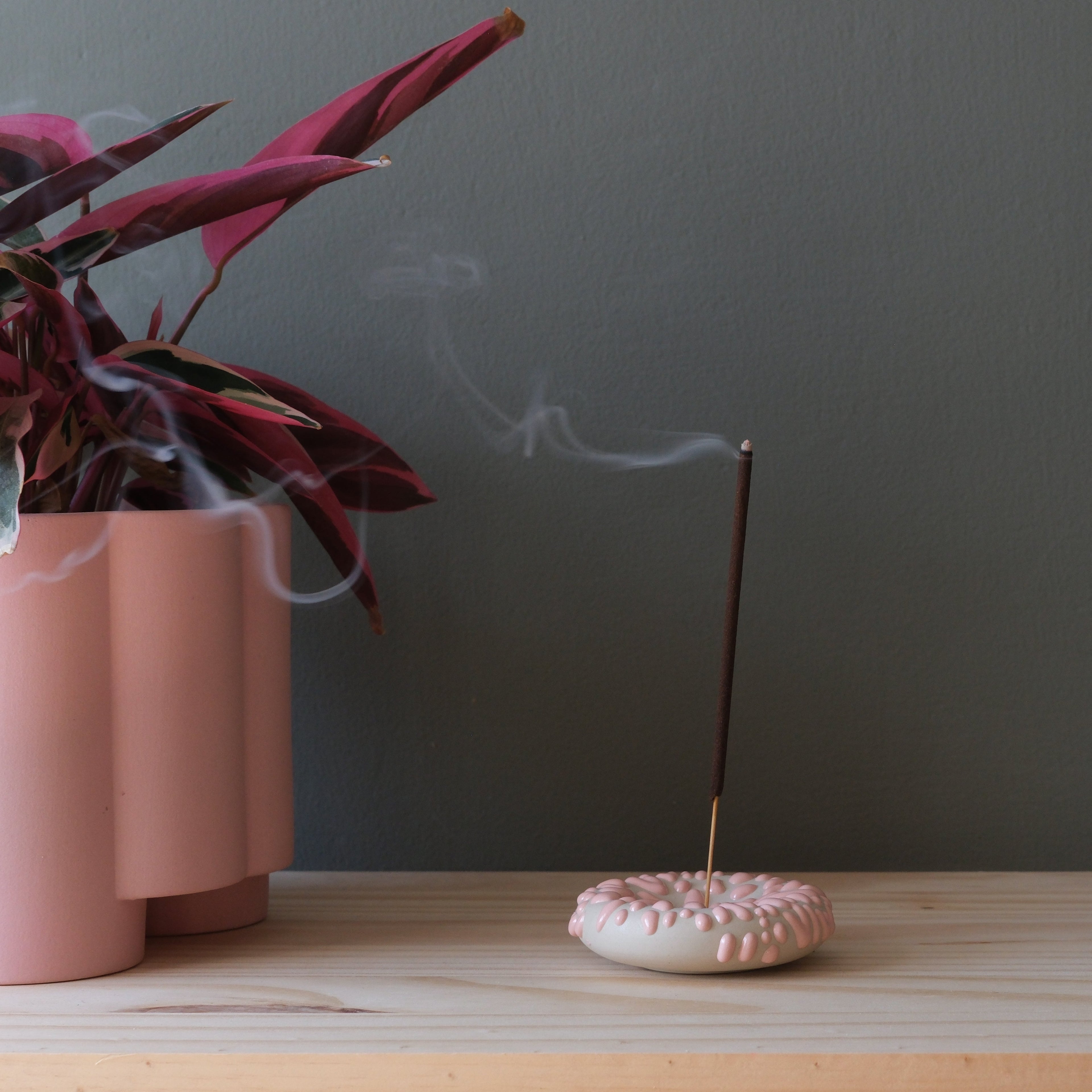 Pink incense sticks in a decorative holder, part of Misewell's Eve incense home accessories collection.