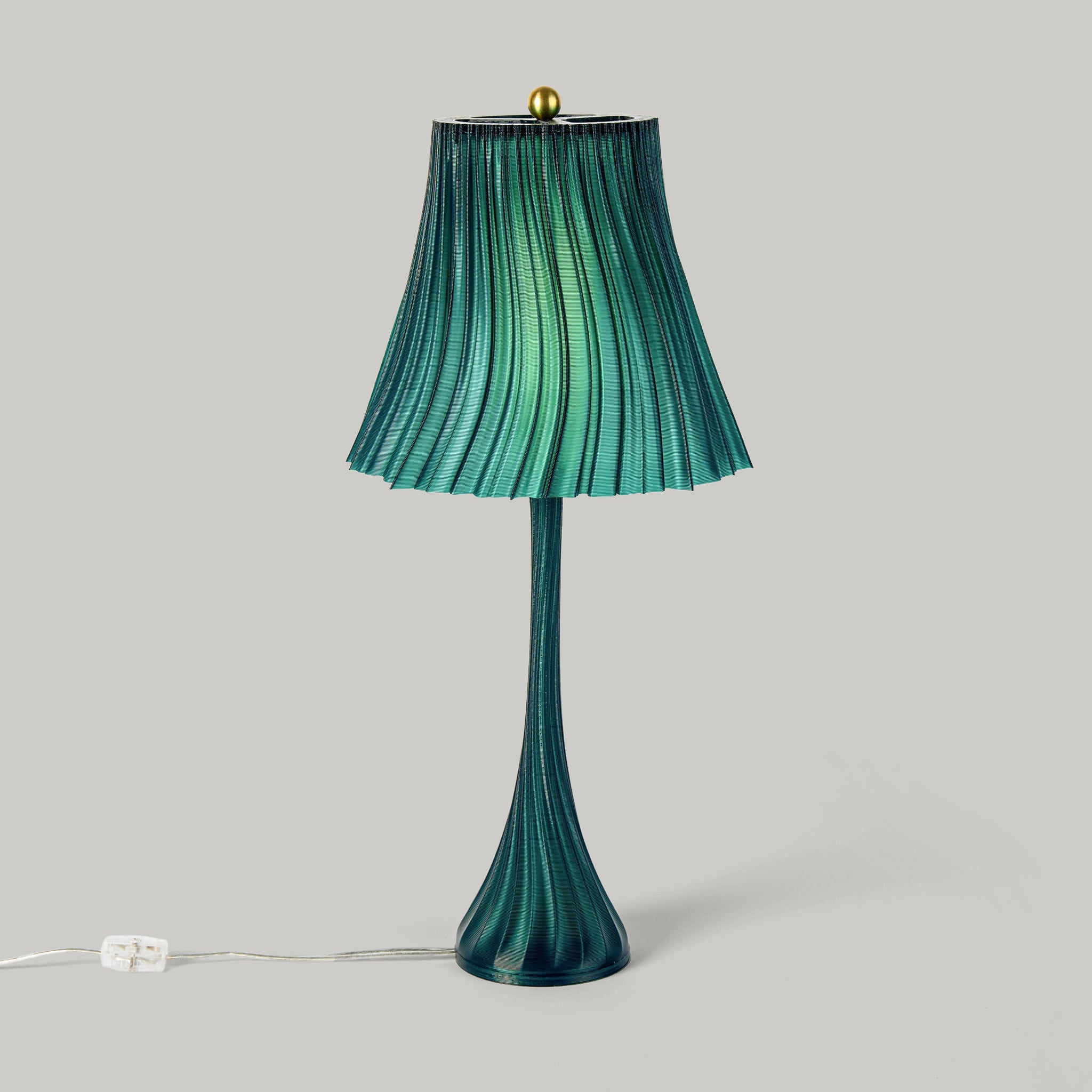 Emerald pleat lamp by Wooj Design featuring a sleek, modern design with pleated fabric shade and minimalist silhouette.