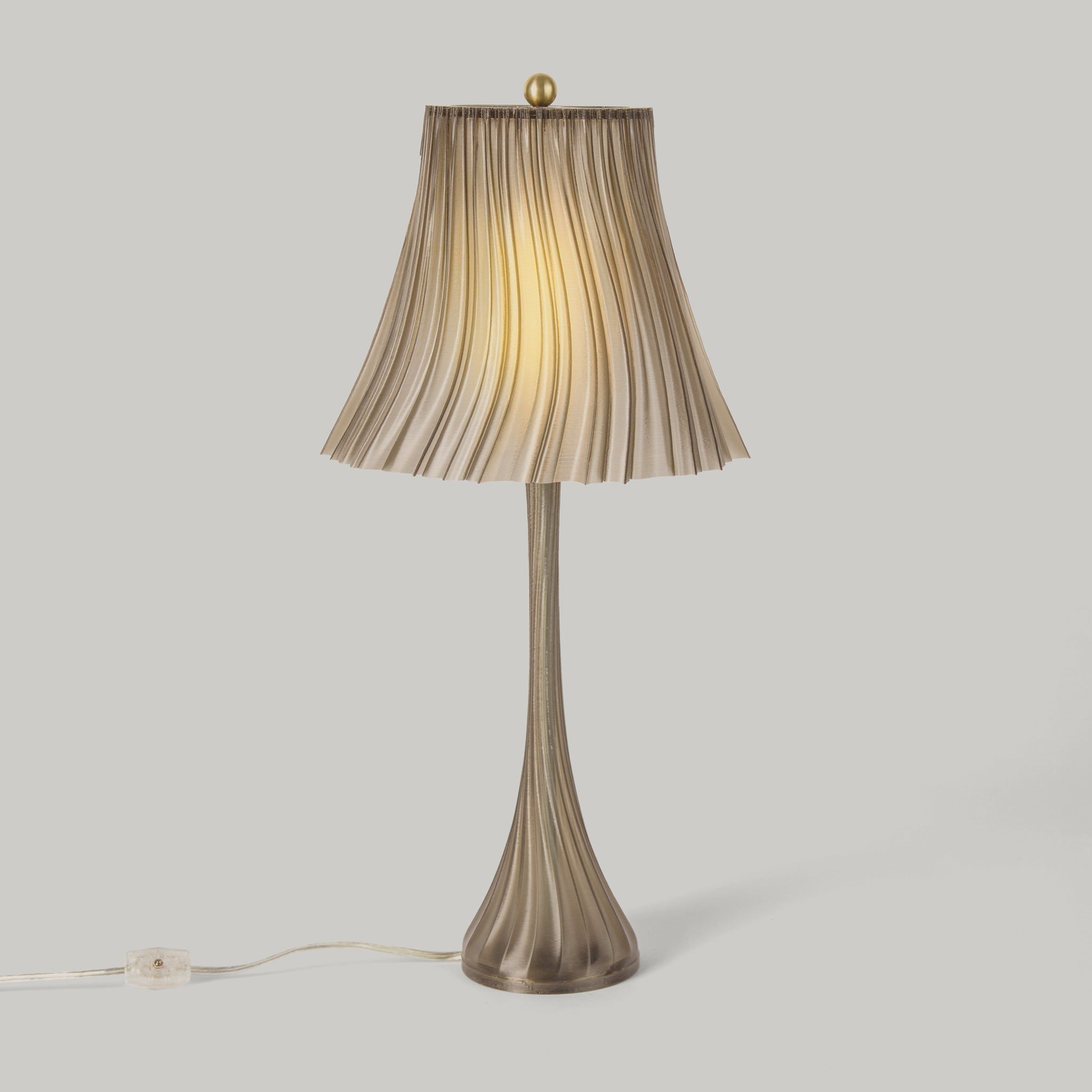 Wooj Design Pleat Lamp with a sleek, pleated fabric shade in a silo smoke color, modern table lamp for stylish interior lighting.