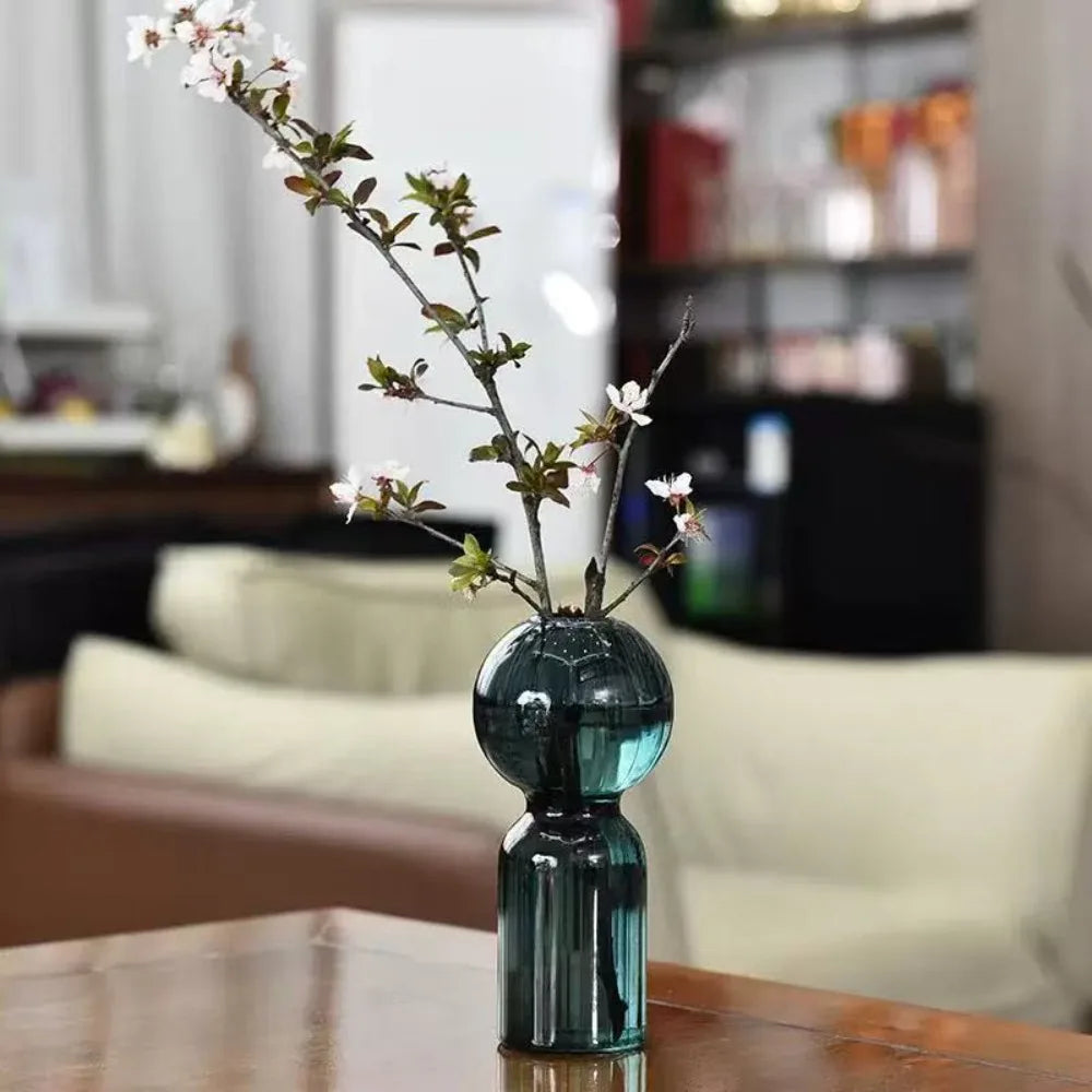 Willowmere Prisma Stripe Vase with colorful striped design, glossy ceramic finish, and rounded shape.