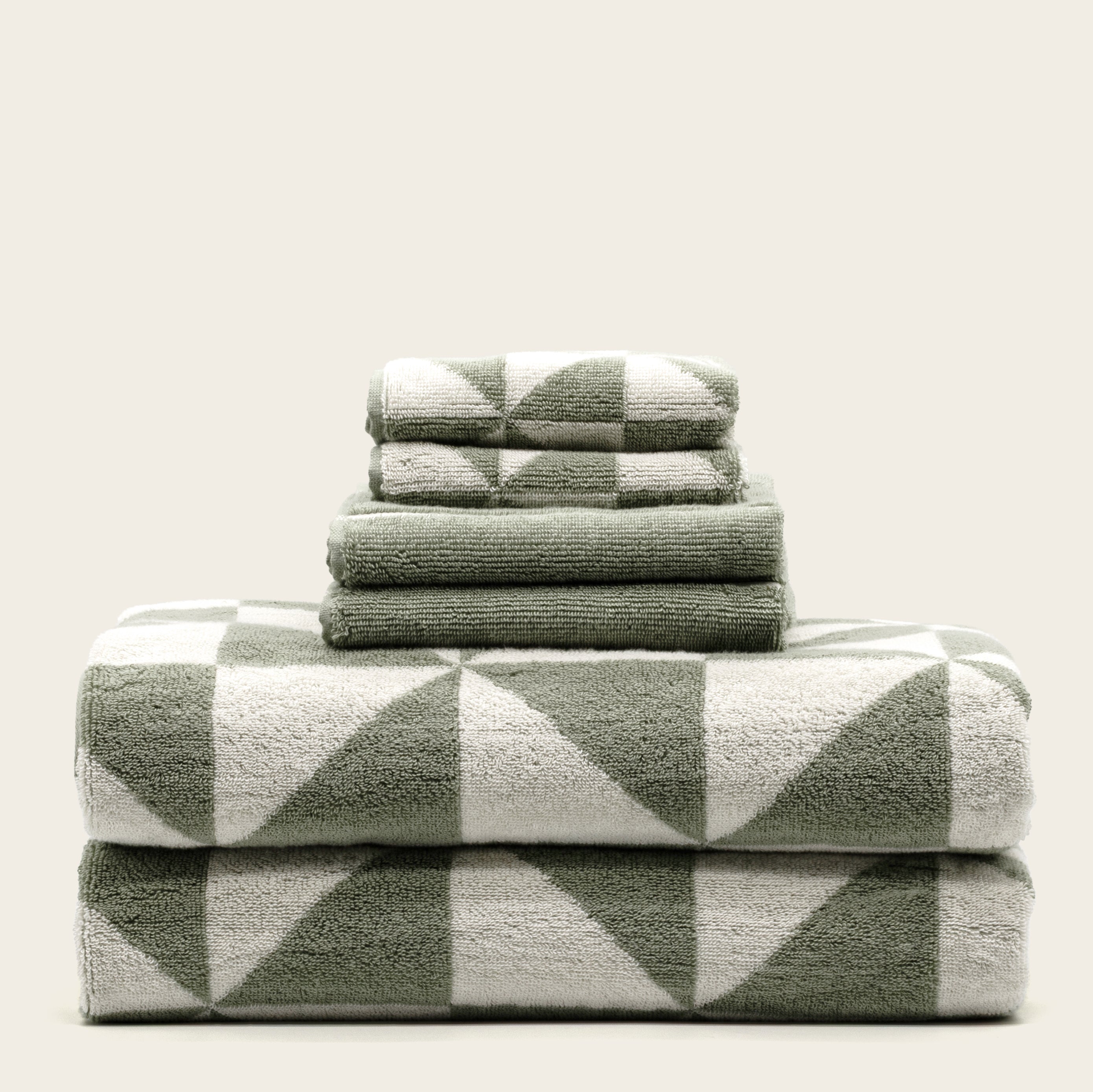 Two plush Umbra Australian cotton bath towels in a luxe set, soft and absorbent, displayed on a bathroom rack.
