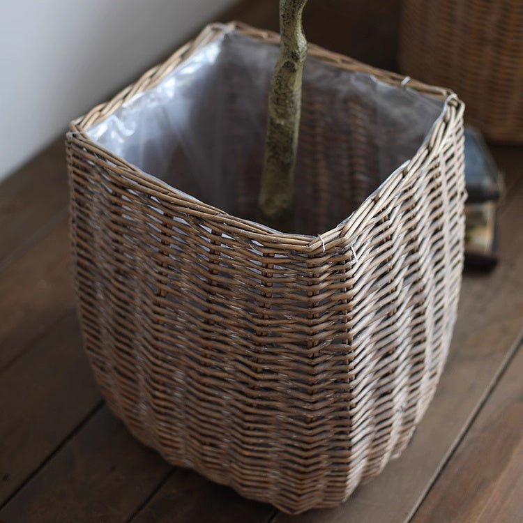 Natural wicker floor planter basket with liner from RusticReach, ideal for indoor or outdoor plant display.