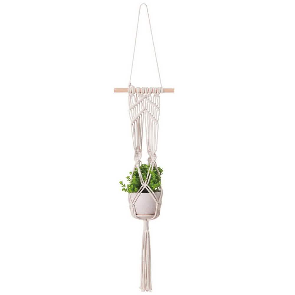 Hand-woven macrame tapestry plant hanger holder for indoor decor, featuring intricate knot details and natural cotton material.