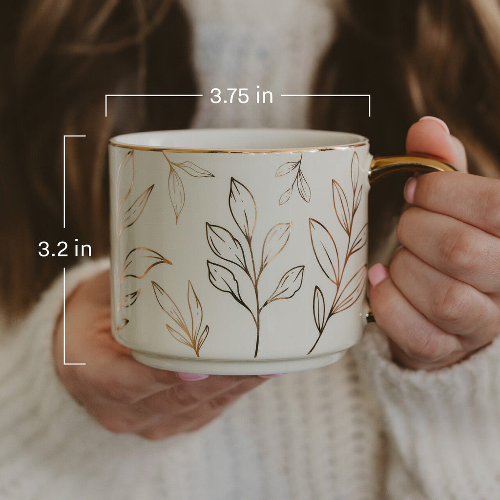 Green Ditsy Floral 14 oz coffee mug with a large gold handle from Sweet Water Decor, featuring a charming floral pattern.