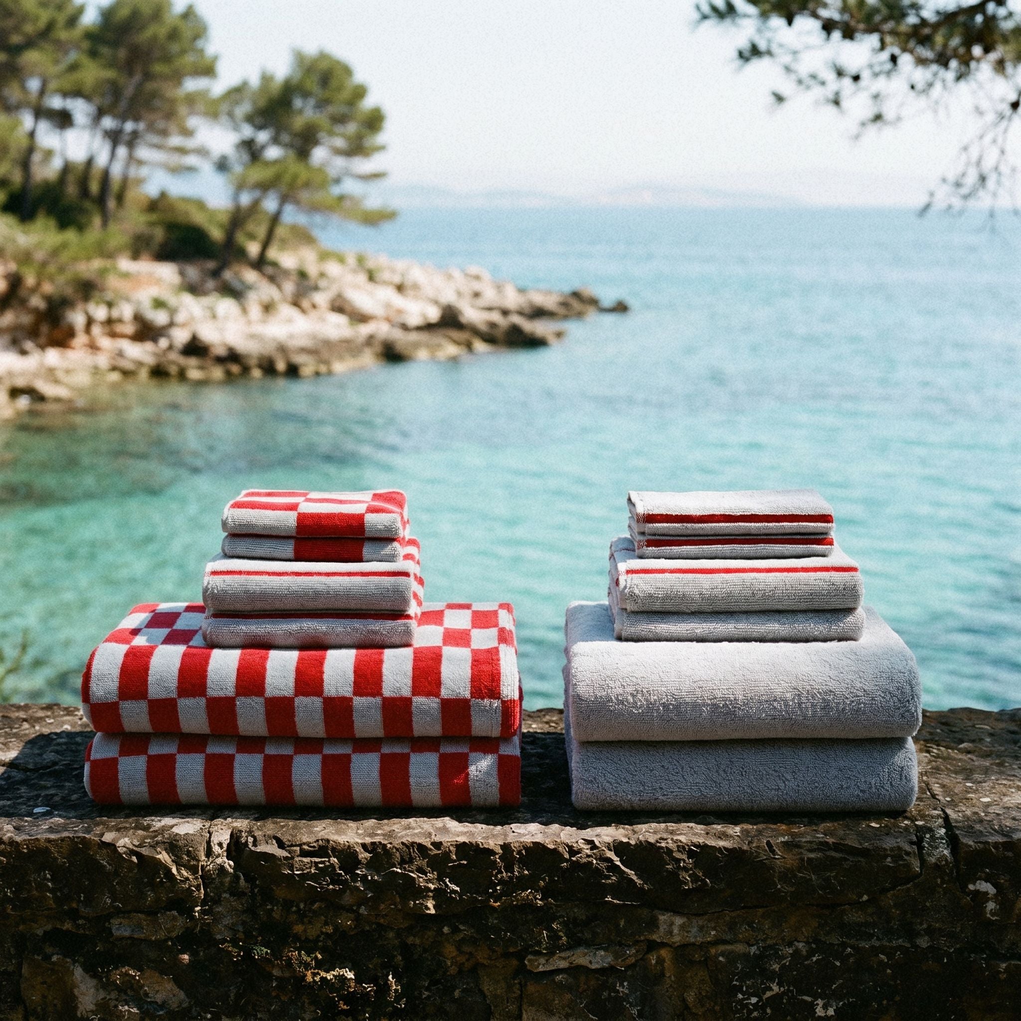 Soft white Pietra Australian cotton towels by Italic, neatly folded with plush texture and subtle weave pattern visible.