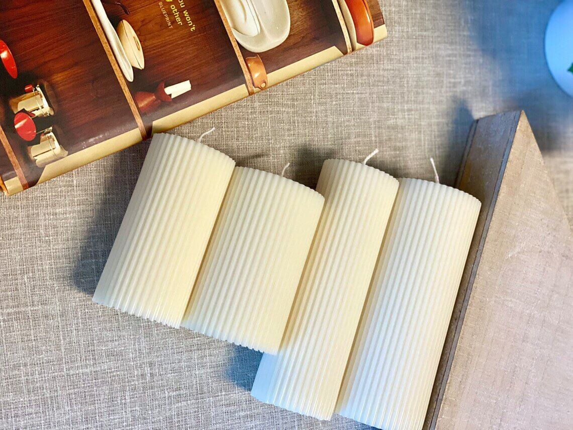 Minimalist ribbed pillar candle from Crazy About Candles, showcasing textured design ideal for home decor.