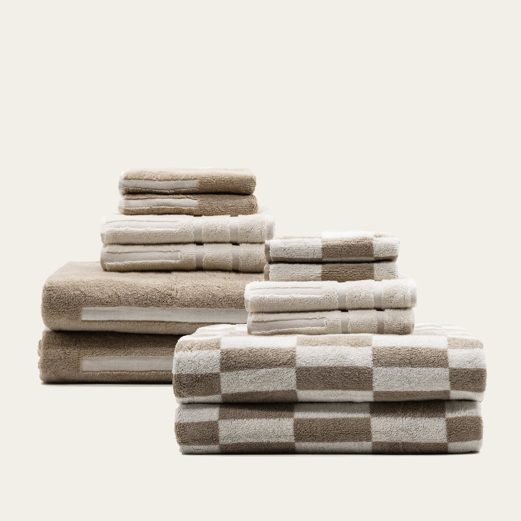 Set of Pietra Australian cotton towels featuring soft, plush texture and neutral tones for luxurious bathroom use.