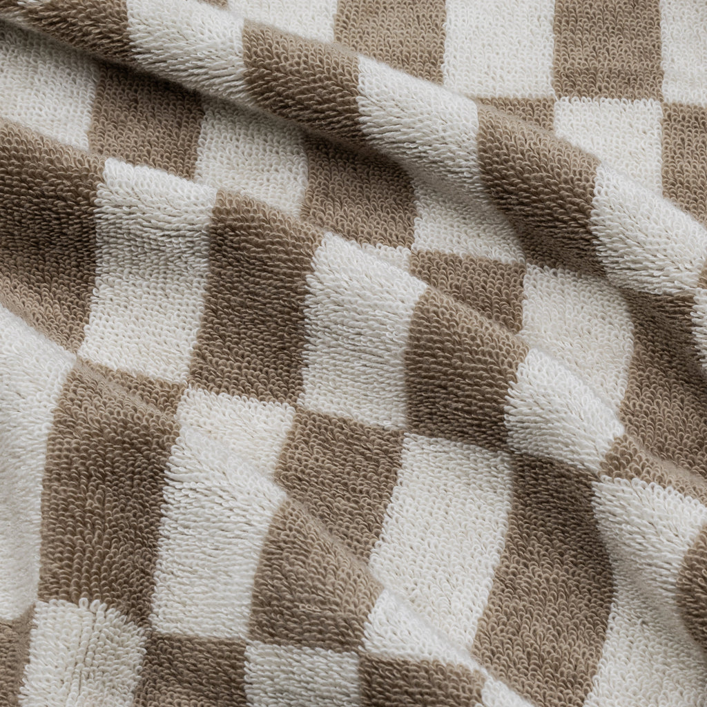 Swatch of Pietra Australian Cotton Towels by Italic showing soft, plush fabric in neutral tones for luxurious bathroom use.