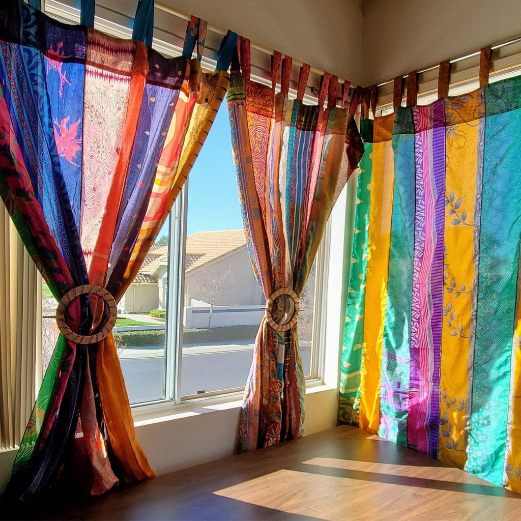 Rainbow Oasis upcycled sari curtains from Darn Good Yarn, featuring colorful boho crochet and knit eco-friendly home decor.