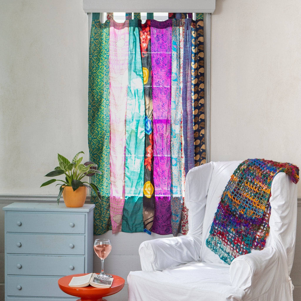 Colorful Rainbow Oasis upcycled sari curtains by Darn Good Yarn, boho home decor with eco-friendly recycled yarn.