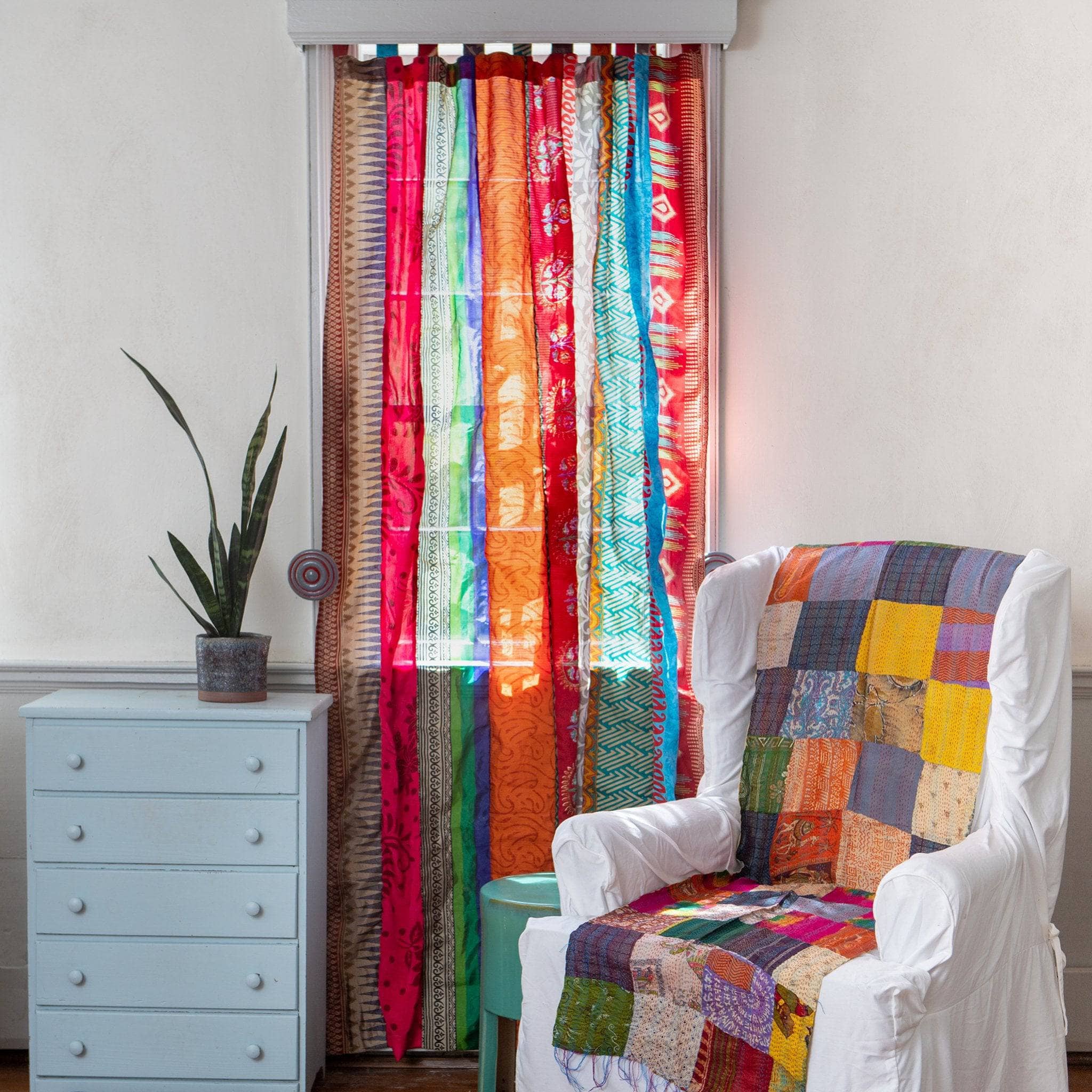 Colorful Rainbow Oasis boho curtains made from recycled sari fabric, eco-friendly home decor by Darn Good Yarn.