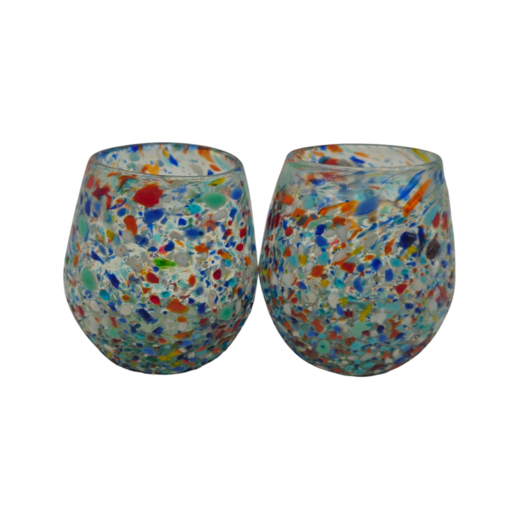 Handblown XL stemless Mexican wine glass with colorful confetti pebble pattern, designed by The Talavera Hub.